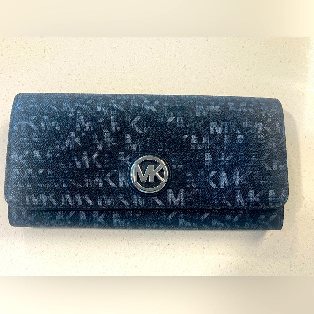 Signature Michael Kors Fulton flap Continental wallet.